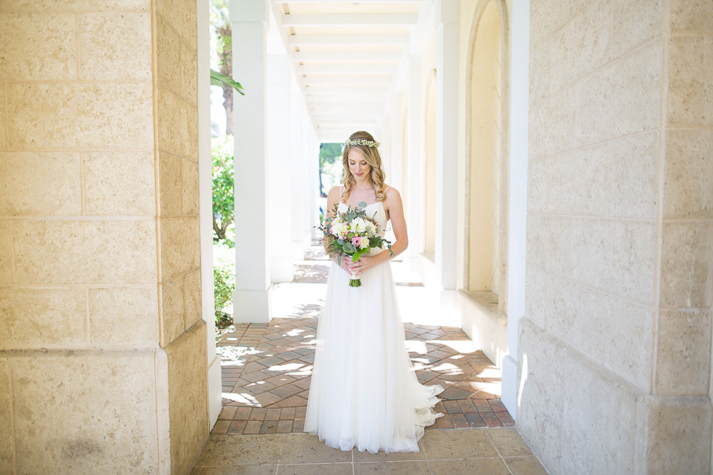 Outdoor Bride Wedding Portrait in A-line Spaghetti Strap Lace Wedding Dress with Greenery, White and Pink Floral Bouquet, Curled Hair Down and Floral Crown Hairpiece | Tampa Bay Hair and Makeup Femme Akoi Beauty Studio
