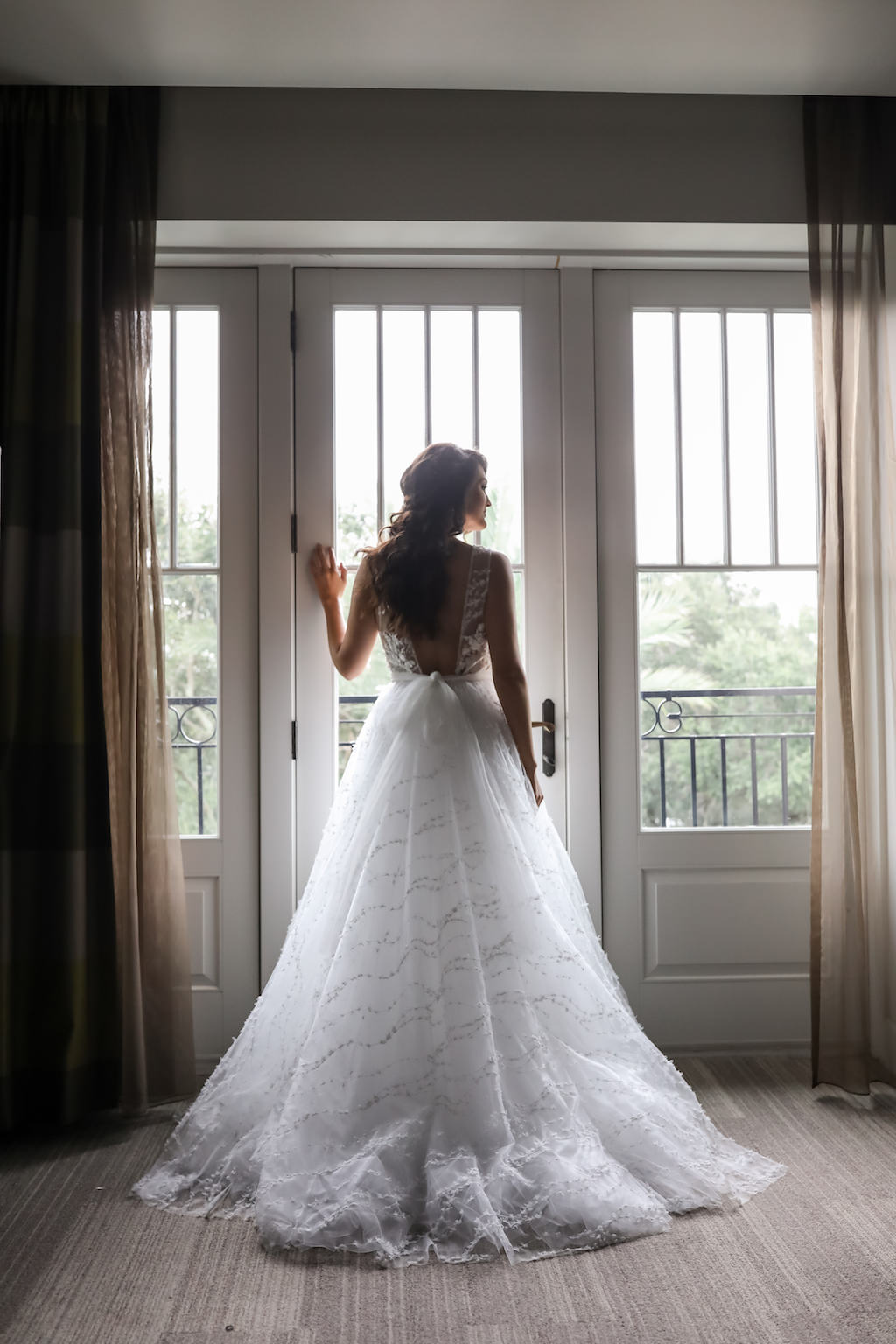 Bride Wedding Portrait in A-Line Illusion Low Back with Tulle Ribbon, Tank Top Straps and Floral Lace Appliques Wedding Dress Bay Photographer Lifelong Photography Studios | Hair and Makeup LDM Beauty Group | Wedding Dress Shop The Bride Tampa