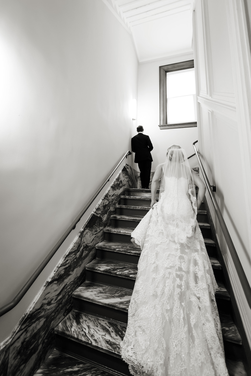 Bride and Groom First Look Wedding Portrait on Stairs | Historic Downtown Tampa Wedding Venue Le Meriden