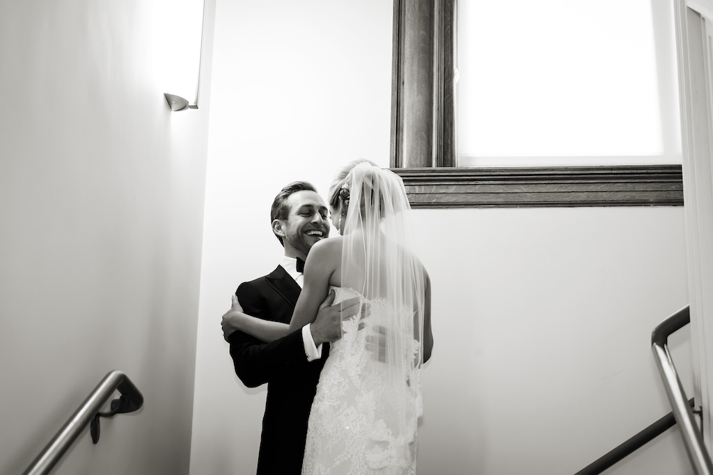 Bride and Groom First Look Wedding Portrait on Stairs | Historic Downtown Tampa Wedding Venue Le Meriden