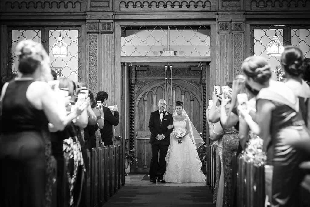Bride and Father of Bride Walking Down Aisle at Wedding Ceremony Portrait
