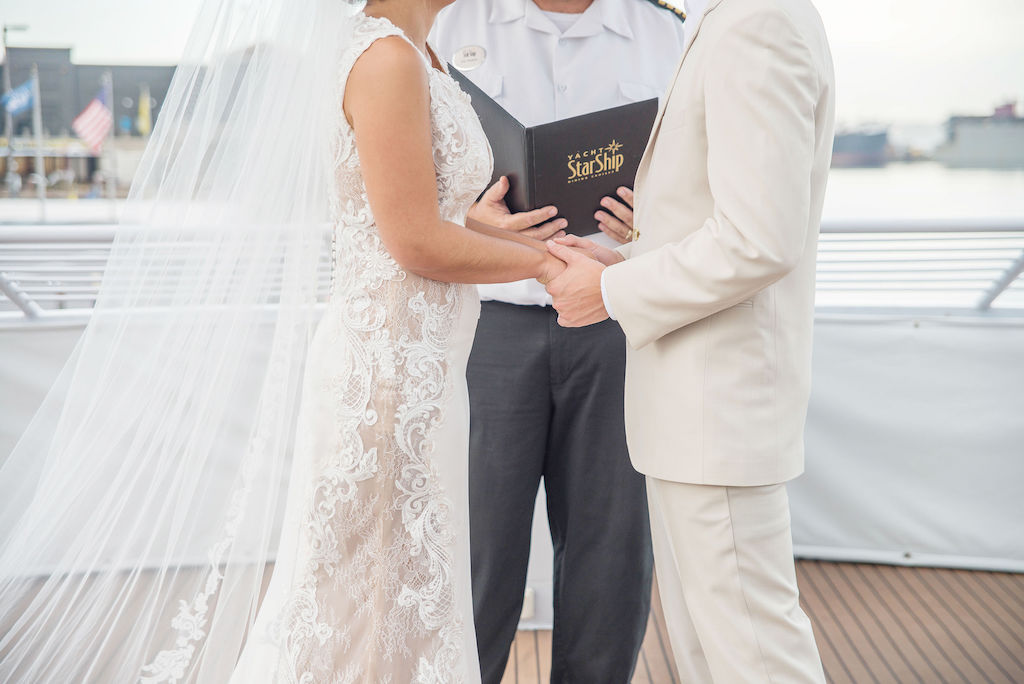Florida Bride and Groom Wedding Ceremony Portrait on Deck of Tampa Waterfront Venue Yacht Starship II | Tampa Bay Wedding Photographer Kristen Marie Photography