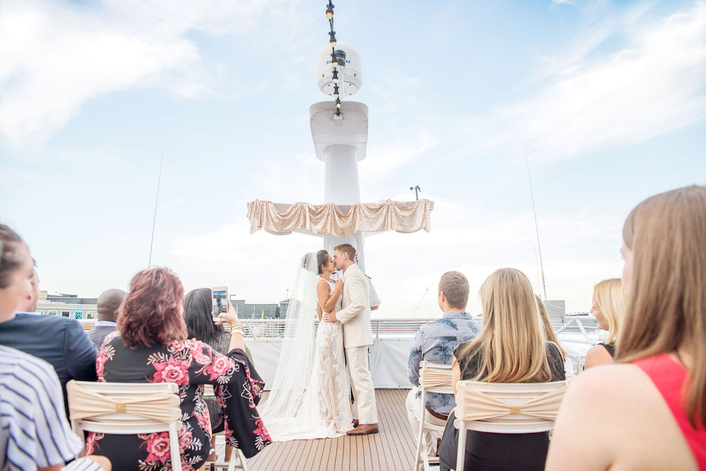 Florida Bride and Groom Wedding Ceremony Portrait on Deck of Tampa Waterfront Venue Yacht Starship II | Tampa Bay Wedding Photographer Kristen Marie Photography