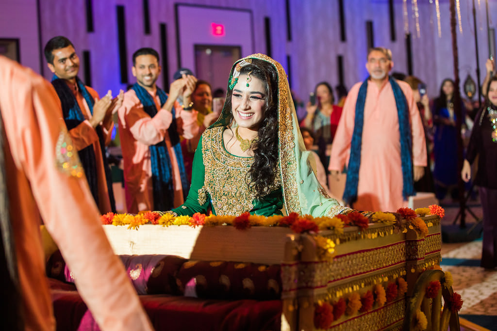 Glamorous Traditional Indian Wedding Ceremony, Bride in Green and Gold Sari at Gold Alter with Orange and Yellow Flowers