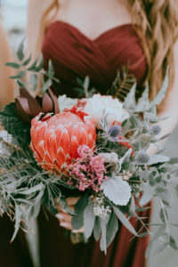 Bride Wedding Portrait with Wild Organic Red, Burgundy, Blush Pink and Greenery Floral Bouquet