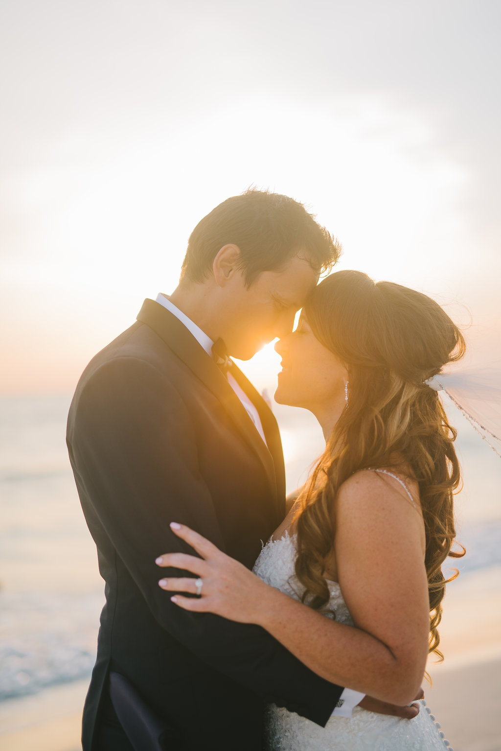 Florida Outdoor Beach Sunset Bride and Groom Wedding Portrait | Tampa Bay Photographer Kera Photography | St. Pete Beach Wedding Venue Tradewinds Island Resort | Hair and Makeup Michele Renee the Studio