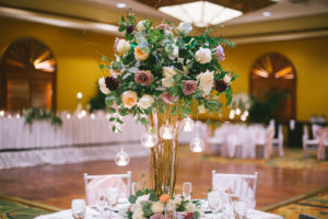 Ballroom Wedding Reception Decor, Tall Wooden Branches Centerpiece with Blush Pink, Ivory/White, Lilac, Deep Purple and Greenery Florals, Hanging Cylinder Candles, Silver Chiavari Chairs | Tampa Bay Photographer Kera Photography | Rentals A Chair Affair