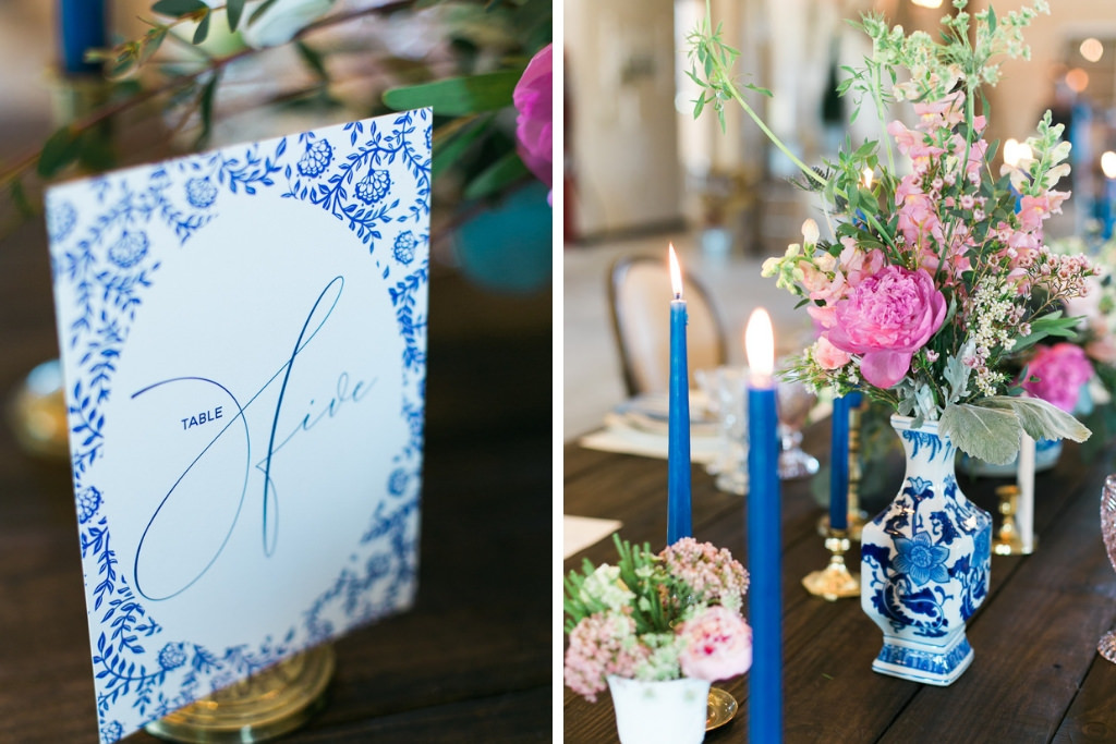 Vintage Elegant Wedding Reception Decor, Long Wooden Feasting Table with Blue Candlesticks, Blue and White Vase with Pink and Greenery Floral Centerpiece, Antique Inspired Table Number | Tampa Bay Wedding Stationary A&P Design Co