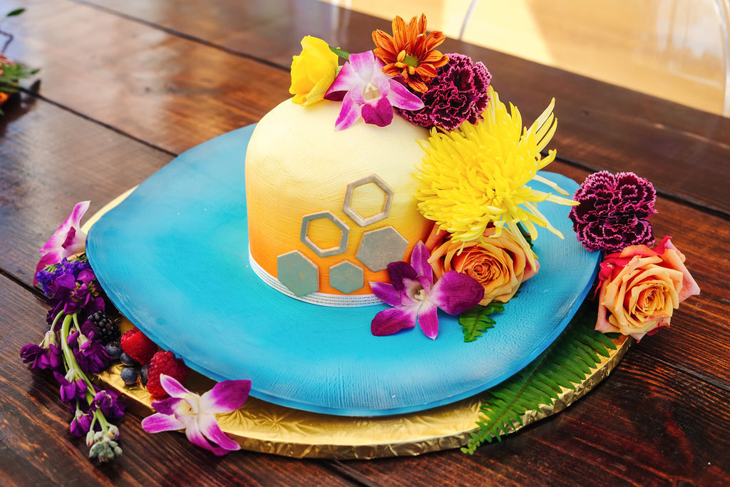 Tampa Bay Bachelorette Party Custom Cake in Shape of Hat in Baby Blue and Orange Ombre with Gold Geometric Shapes and Real Colorful Tropical Florals | Tampa Bay Photographer Grind and Press Photography