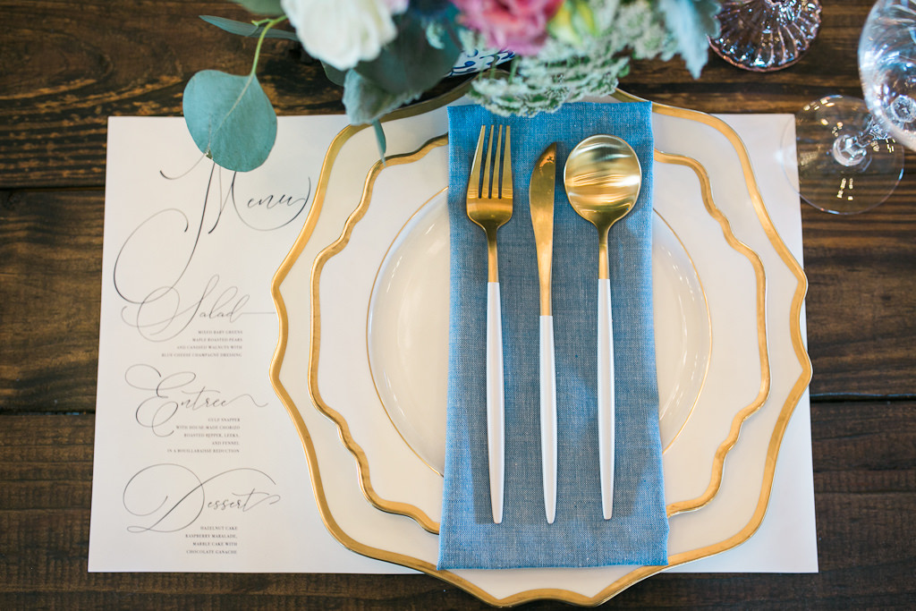 Vintage Elegant Wedding Reception Decor, Gold Rimmed China Plates, Dusty Blue Linen, White and Gold Silverware on. Custom Menu Placemat | Tampa Bay Wedding Stationary A&P Design Co