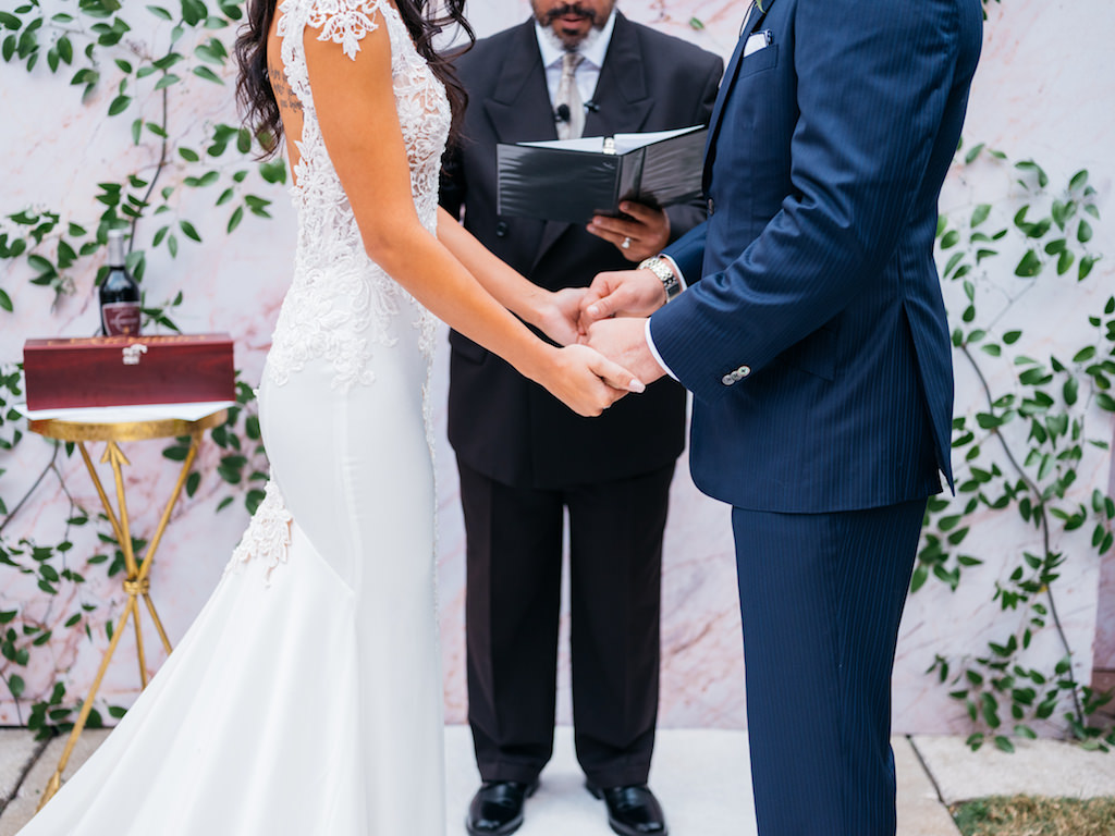 Bride and Groom Wedding Ceremony Portrait, Bride in Fitted Lace and Illusion Low Back Cap Sleeve Pnina Tornai Wedding Dress, Groom Professional Tampa Bay Rays Baseball Player Kevin Keirmaier in Navy Blue Suit | Tampa Bay Wedding Planner Parties A'la Carte