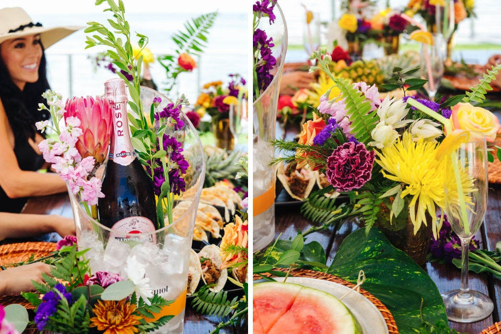 Tropical Colorful Decor for Waterfront Bachelorette Party, Pink, Yellow, Purple, and Greenery Floral Centerpieces, Rose in Ice Bucket | Tampa Bay Wedding Photographer Grind and Press Photography