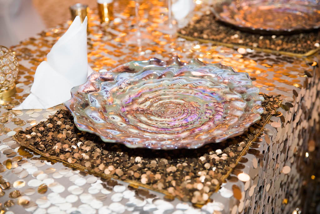 Glamorous Traditional Indian Ceremony Decor, Luster Glass Rose Shaped Charger on Bronze Sequin Placemat and Silver and Gold Sequin Tablecloth