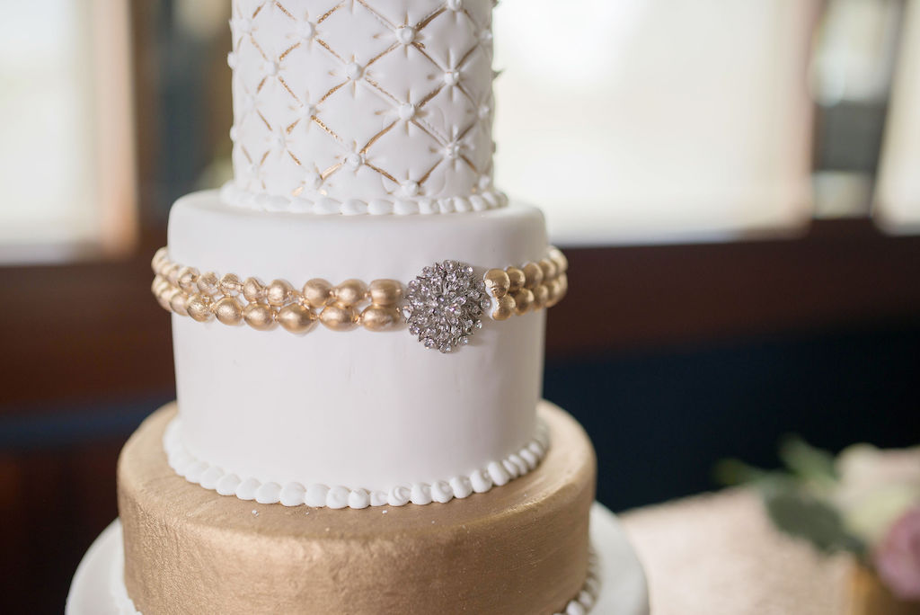 Elegant Three Tier White and Gold Cake with Rhinestone Brooch Accent | Tampa Bay Wedding Photographer Kristen Marie Photography