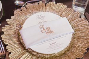 Elegant Wedding Reception Inspiration | Custom Monogram Linen Napkins with Round Menu Card and Gold Charger Plate