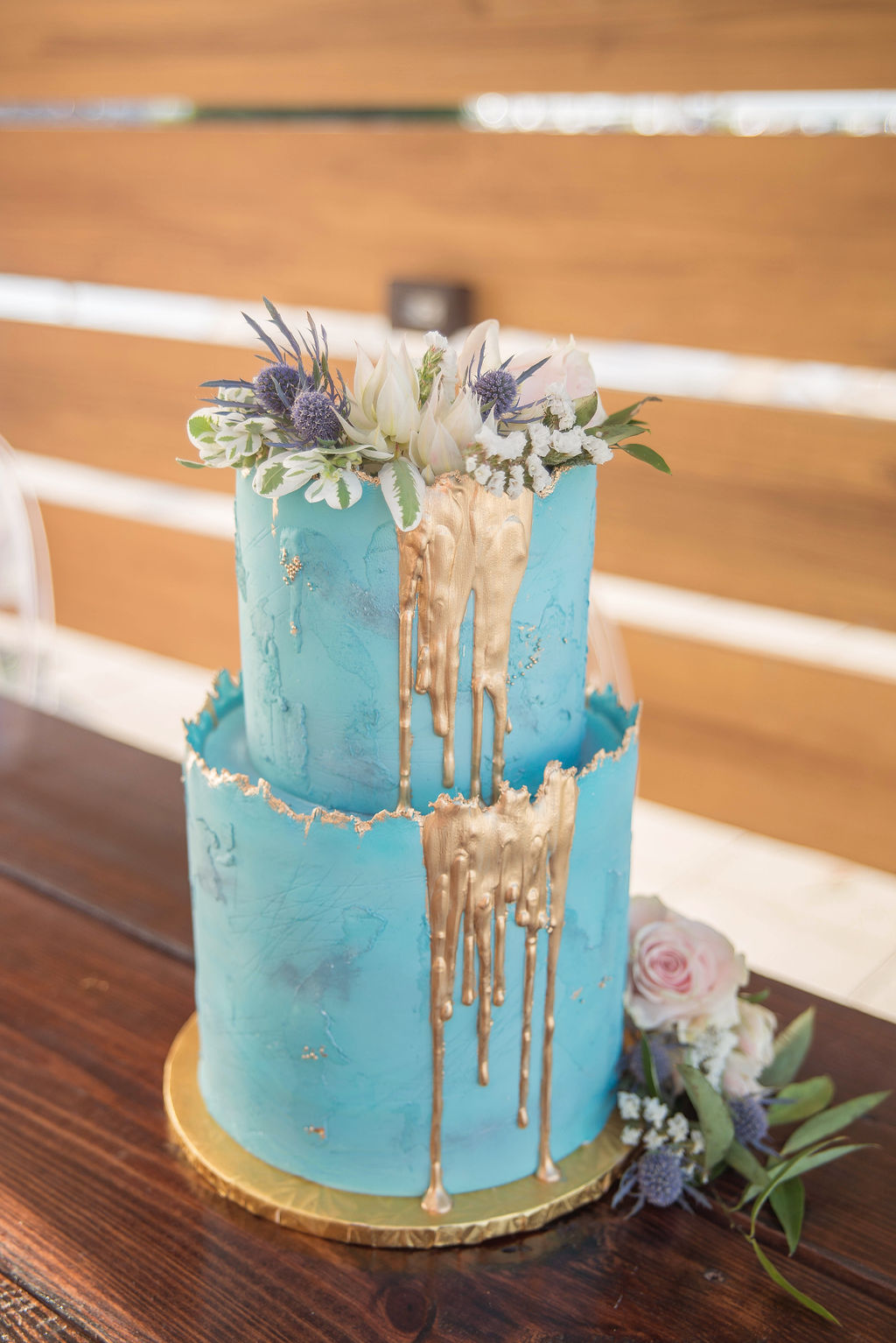 Two Tier Dusty Blue Cake with Gold Drip Detailing and Real Floral Cake Topper | Tampa Wedding Photographer Kristen Marie Photography | Wedding Cake The Artistic Whisk Instagram