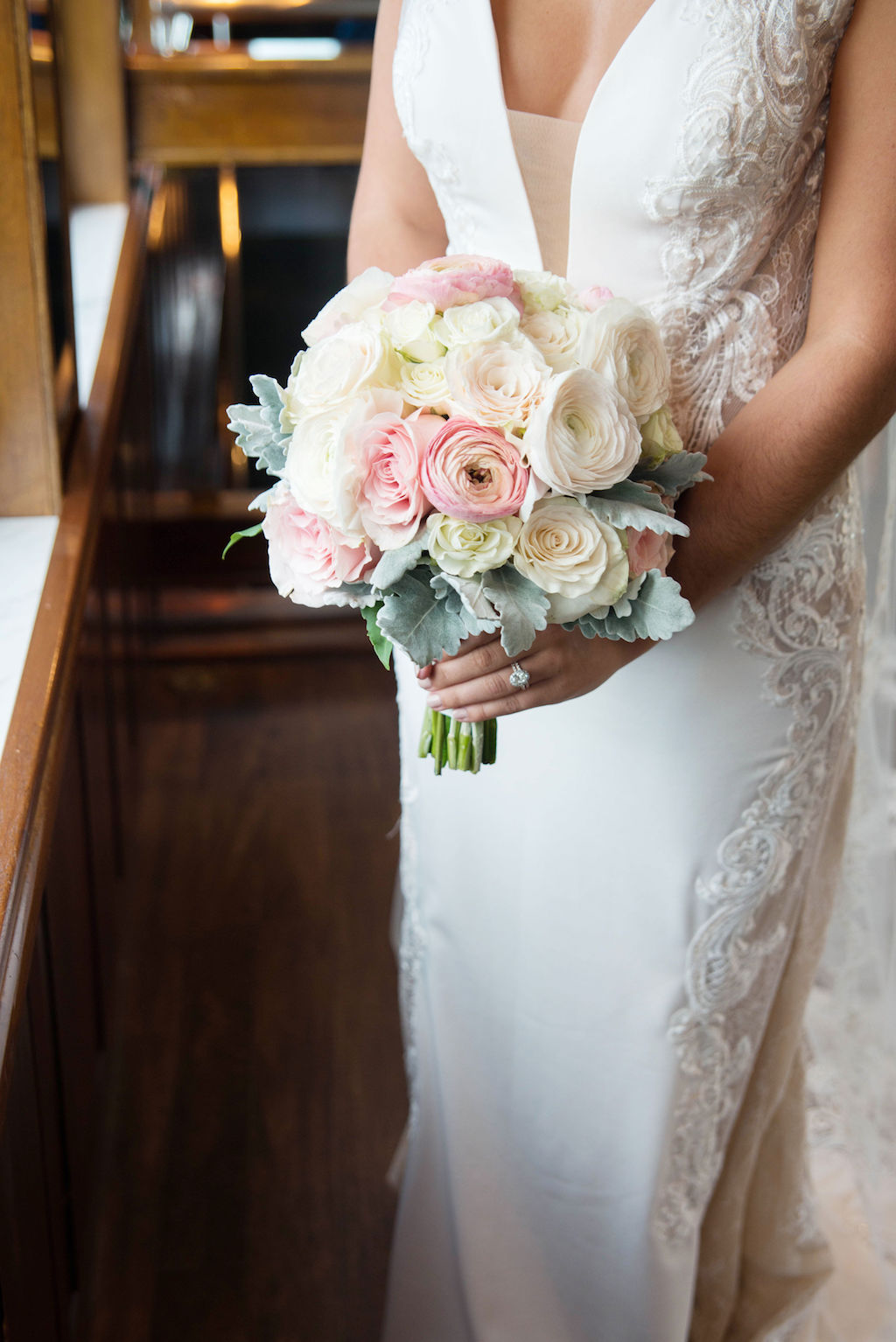Bride Wedding Portrait in Deep V Neck Illusion Fitted Lace Tank Top Strap Wedding Dress with Blush Pink, Ivory and Dusty Miller Leaves Floral Bouquet | Tampa Bay Wedding Photographer Kristen Marie Photography | Wedding Dress Nikki's Glitz and Glam Boutique