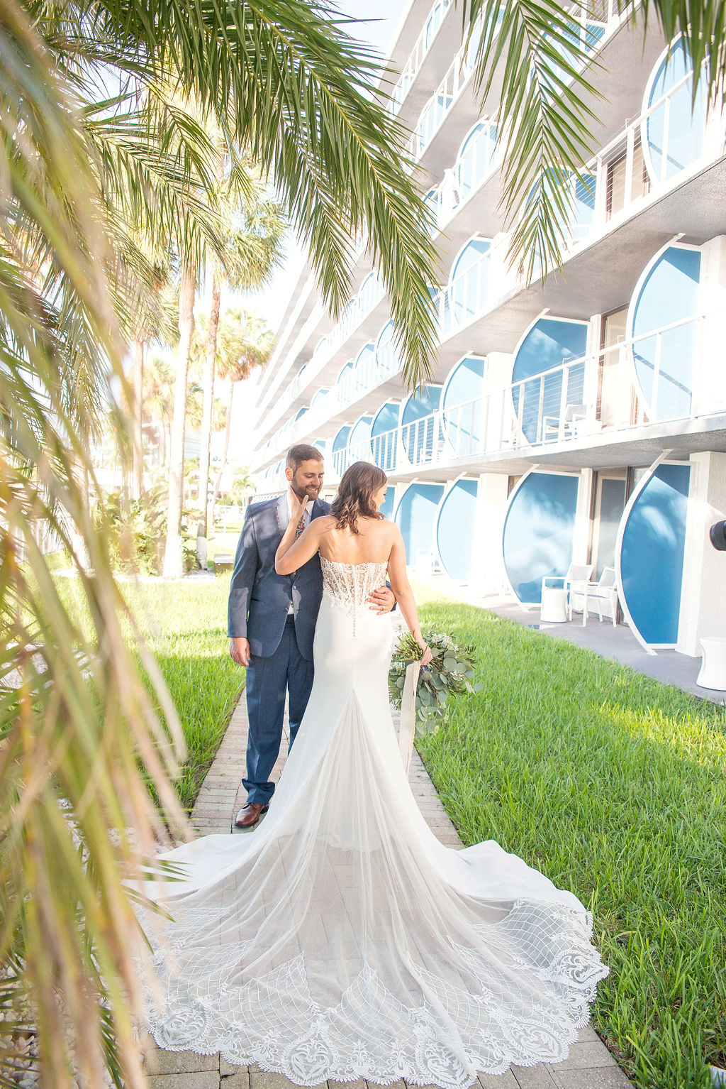 Florida Outdoor Bride and Groom Wedding Portrait, Bride in Strapless Illusion and Lace Bodice Wedding Dress with Tulle and Lace Skirt | Tampa Wedding Photographer Kristen Marie Photography | Waterfront Tampa Venue The Godfrey