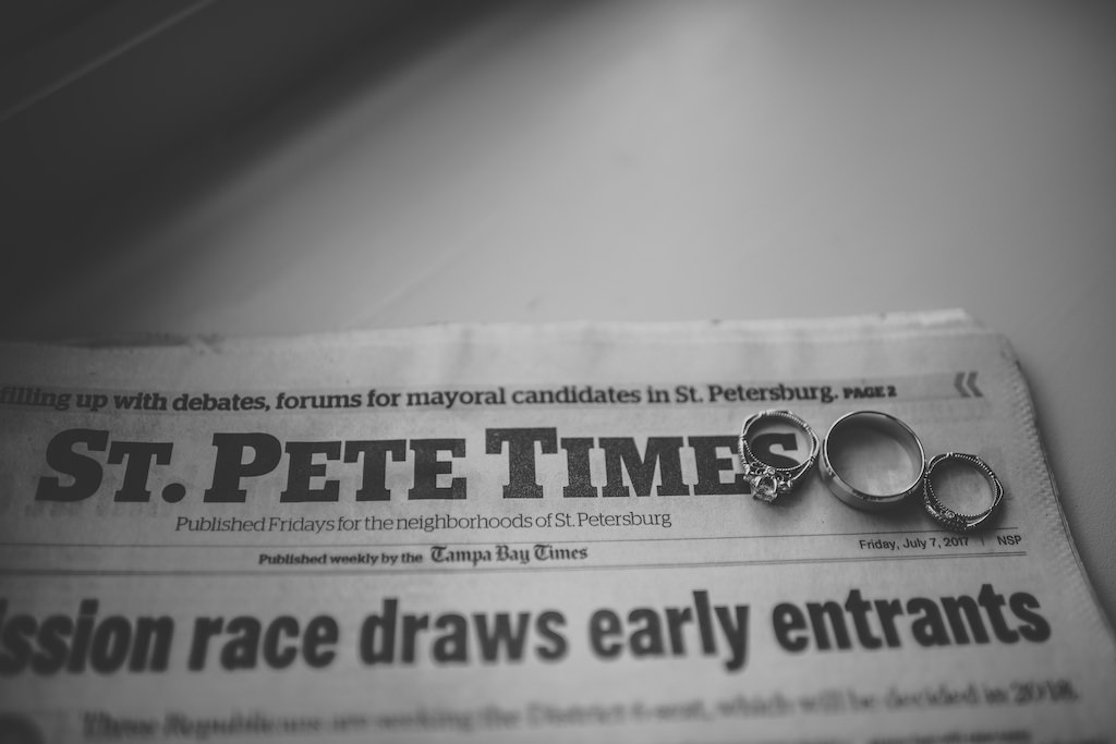 Engagement Ring and Wedding Rings on St. Pete Times Newspaper