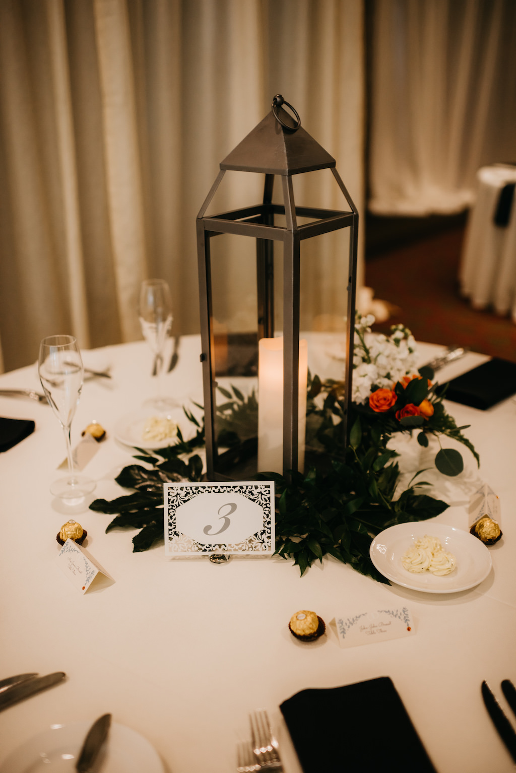 Old Florida Inspired Wedding Reception Decor, Tall Black Lantern with Candle, Greenery Wreath and Table Number