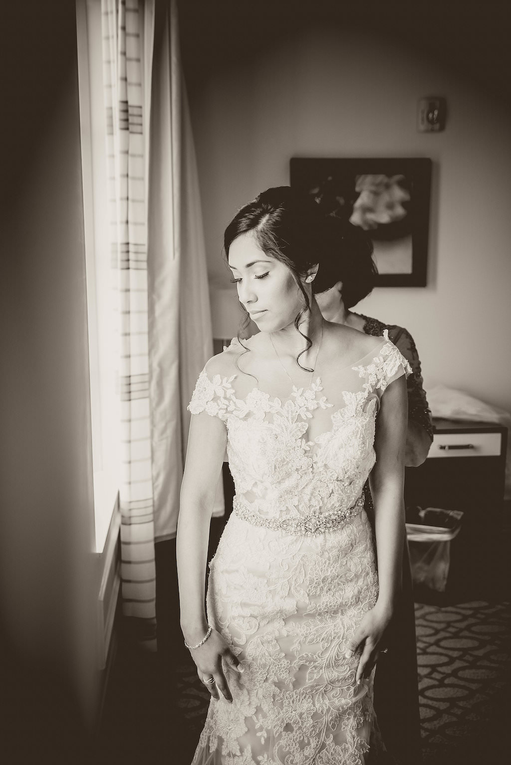 Florida Bride Getting Ready Portrait in Fitted Allure Lace and Illusion Cap Sleeve Wedding Dress with Rhinestone Belt | Tampa Bay Wedding Photographer Kristen Marie Photography