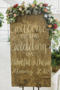 Rustic Wooden Wedding Welcome Sign with Greenery Blush Pink, Orange and Red Floral Decor