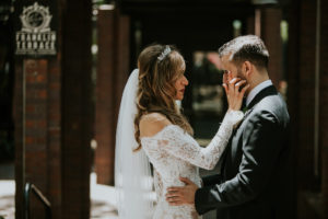 Emotional Bride and Groom First Look Wedding Portrait | Tampa Bay Wedding Photographer Brandi Image Photography