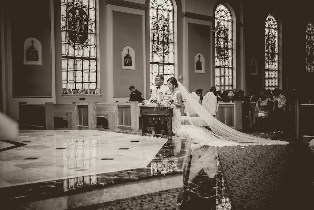 Florida Bride and Groom Wedding Ceremony Portrait at Altar of Church | Tampa Bay Wedding Photographer Kristen Marie Photography | St. Pete Wedding Venue St. Paul's Catholic Church