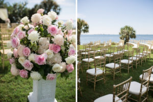 Florida Outdoor Waterfront Wedding Ceremony Decor, Arch with White Draping and Floral Bouquets, White Pedestals with Blush Pink, White and Greenery Floral Bouquets, Gold Chiavari Chairs | Tampa Bay Wedding Photographer Cat Pennenga Photography | Wedding Planner NK Productions | Sarasota Wedding Venue Powel Crosley Estate