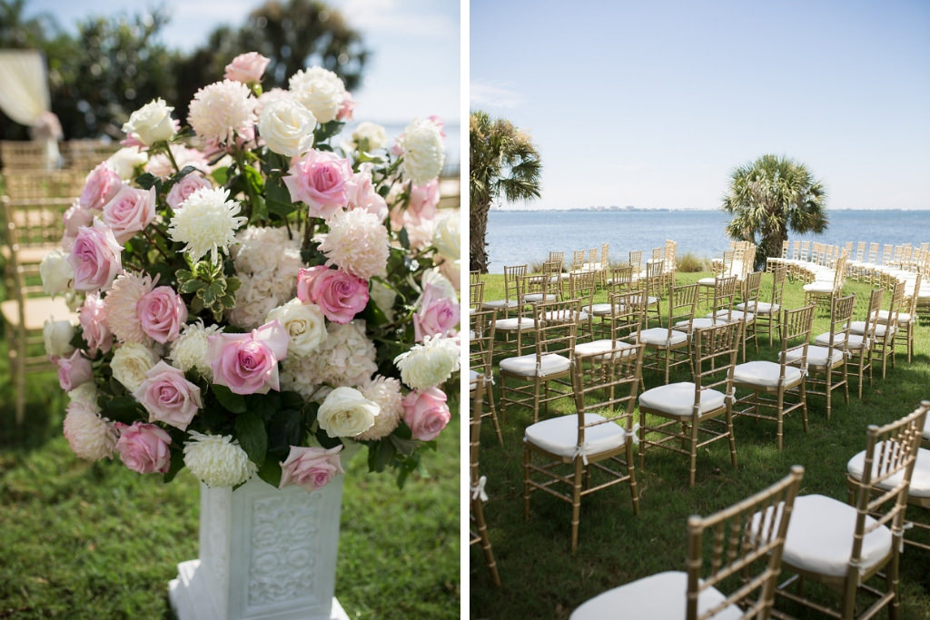 Florida Outdoor Waterfront Wedding Ceremony Decor, Arch with White Draping and Floral Bouquets, White Pedestals with Blush Pink, White and Greenery Floral Bouquets, Gold Chiavari Chairs | Tampa Bay Wedding Photographer Cat Pennenga Photography | Wedding Planner NK Productions | Sarasota Wedding Venue Powel Crosley Estate