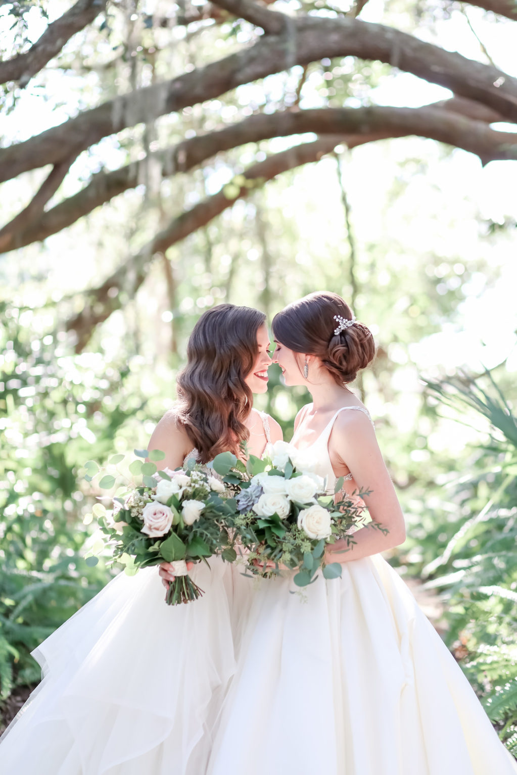 Florida Bride and Bride First Look Lesbian Gay Couple Wedding Portrait with Organic Garden Inspired White, Ivory, Blush Pink and Greenery Wedding Floral Bouquets | Tampa Bay Wedding Photographer Lifelong Photography Studio | Wedding Planner Love Lee Lane