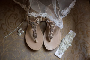 Nude Flat Sandals with Rhinestone Embellishment, Pearl and Rhinestone White Lace Garter, Diamond Bracelet and Earrings | Tampa Bay Wedding Photographer Cat Pennenga Photography