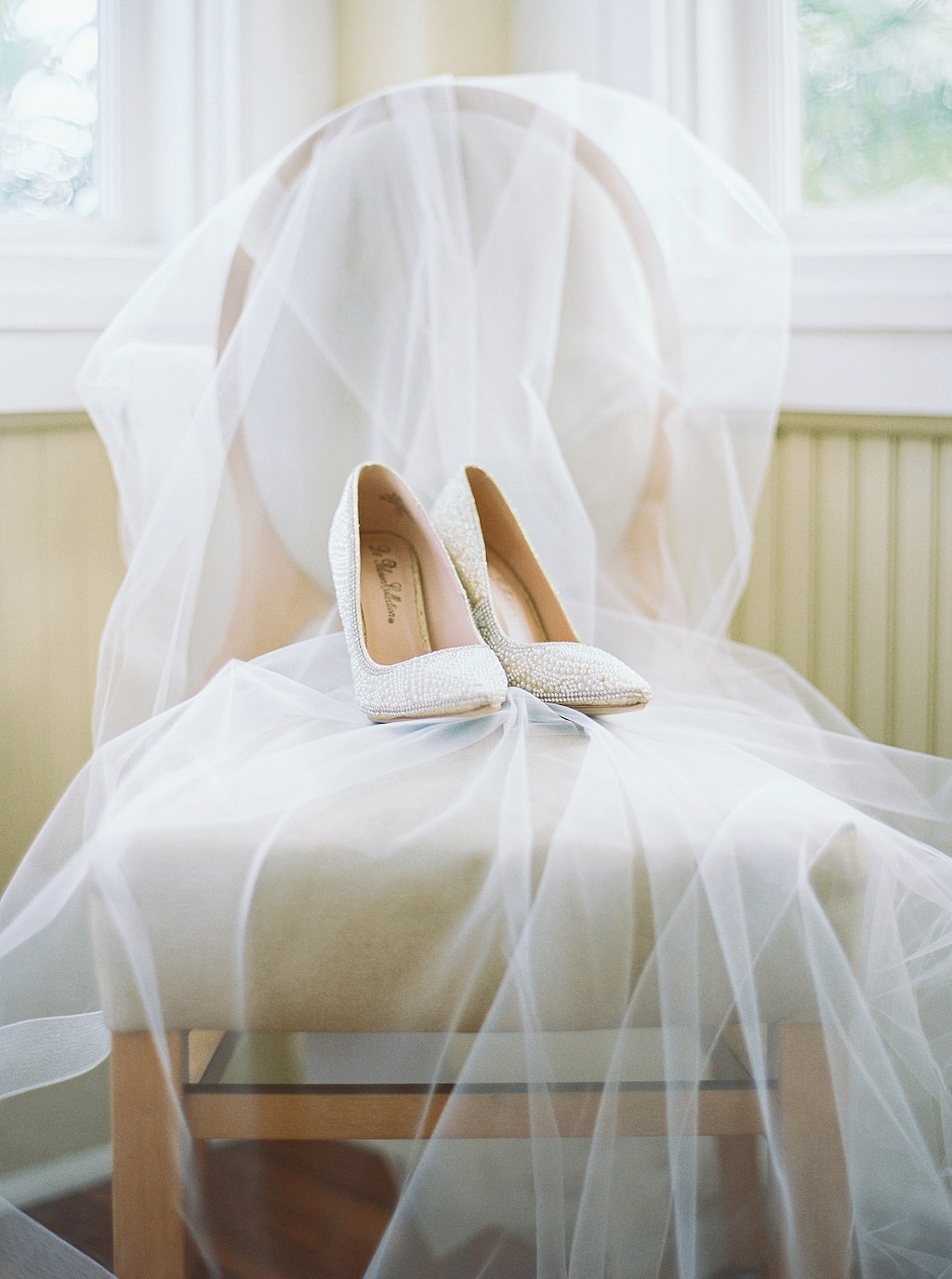 Wedding Veil Draped Over Chair and Pearl Embellished Pointed Toe Wedding Shoes