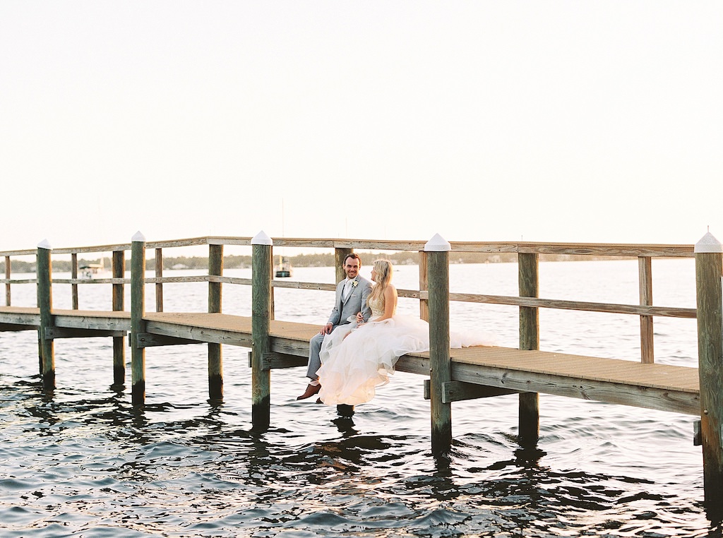 Waterfront Boat Dock Bride and Groom Wedding Portrait | Florida Wedding Venue Palmetto Riverside Bed and Breakfast