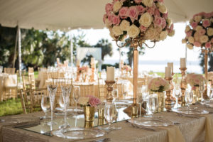 Florida Outdoor Tent Wedding Reception Decor, Long Feasting Table with Gold Tablecloth, Tall Gold Candlestick with Blush Pink and White Floral Bouquets, Gold Mercury Candlestick Holders | Tampa Bay Wedding Photographer Cat Pennenga Photography | Wedding Planner NK Productions