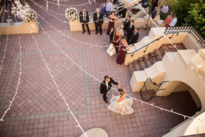 Florida Bride and Groom First Dance in Courtyard Wedding Reception Wedding Portrait | Tampa Bay Wedding Photographer Cat Pennenga Photography | Sarasota Wedding Venue Powel Crosley Estate