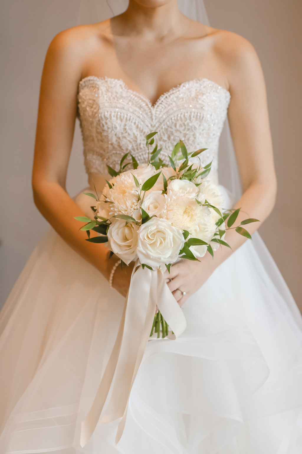 Florida Bride Getting Ready Wedding Portrait, Sweetheart Strapless Lace and Tulle Skirt Ballgown Wedding Dress with White and Greenery Floral Bouquet | Tampa Bay Wedding Photographer Lifelong Photography Studios