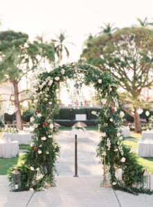 Elegant Modern Garden Courtyard Wedding Ceremony Decor, Greenery, White, Ivory, Red Arch, Gold Candlesticks, Brush Gold Lanterns | Sarasota Wedding Venue Ringling Museum | Tampa Bay Wedding Planner NK Weddings