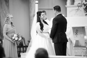 Tampa Bay Bride and Groom Exchanging Vows During Wedding Ceremony Portrait | Wedding Venue Sacred Heart Catholic Church