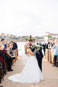Florida Bride and Groom Wedding Ceremony Exit Wedding Portrait | Lakeland Wedding Venue Lake Mirror Amphitheater | Tampa Wedding Planner Love Lee Lane