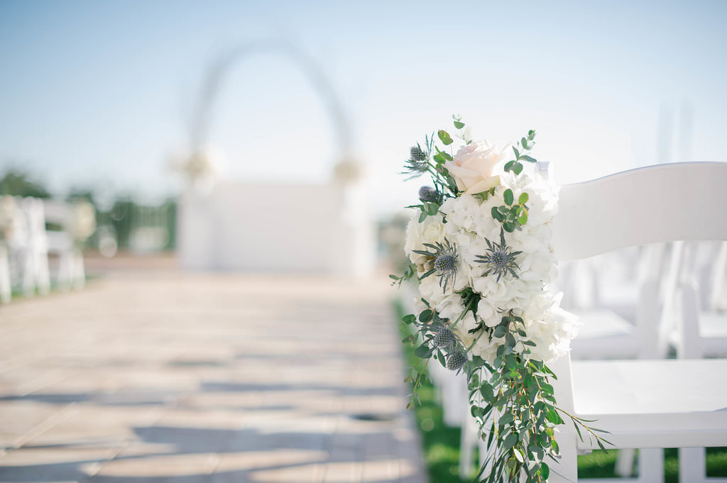 White and blue wedding ceremony aisle chair decor