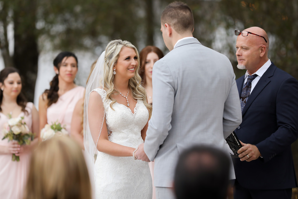 Rustic Bride and Groom Wedding Ceremony Portrait Exchanging Vows | Tampa Bay Wedding Photographer Lifelong Photography Studios | Florida Wedding Venue The White Barn | Tampa Bay Wedding Hair and Makeup Femme Akoi