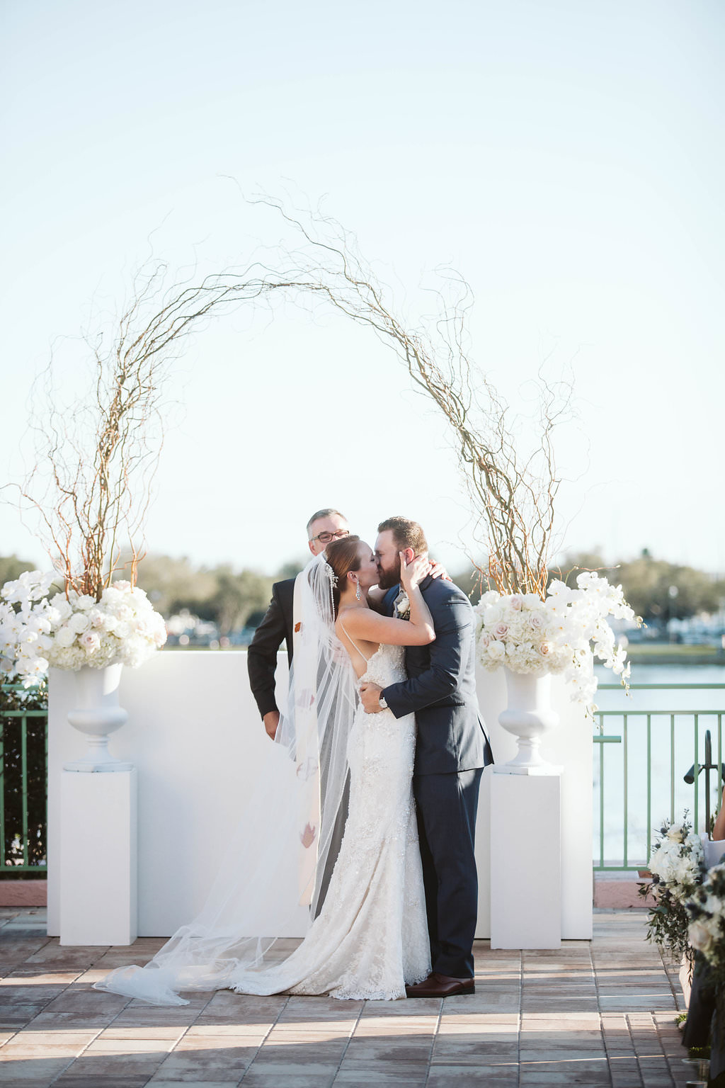 Outdoor Lawn Florida Wedding Ceremony with manzanita branches arch decor and white flowers | Historic Downtown Hotel Venue St. Pete Vinoy Renaissance | Tampa Bay Planner Parties a la Carte