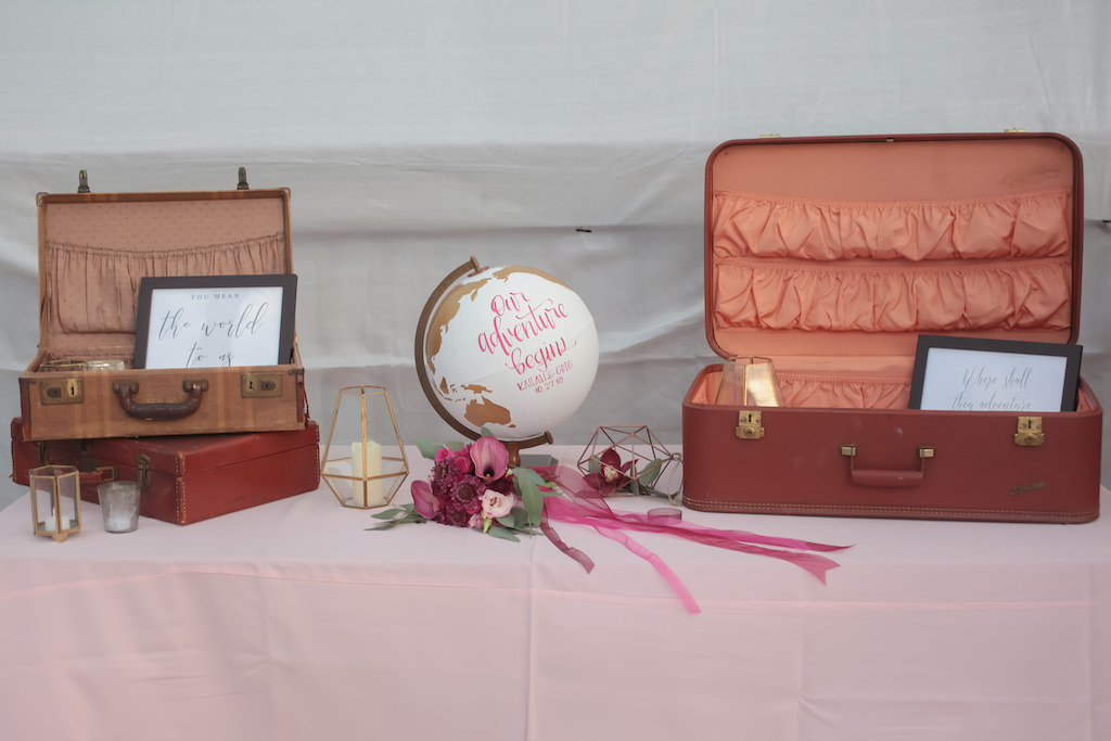 Travel Inspired Wedding Reception Welcome Table Decor, White and Gold Globe, Vintage Suitcases | Tampa Bay Wedding Photographer Lifelong Photography Studios