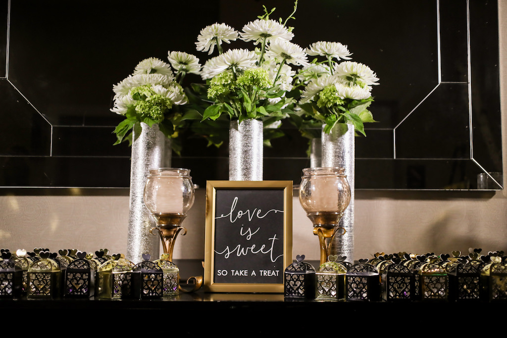 St. Pete Old Hollywood Inspired Wedding Reception Decor, Tall Silver Vases with White and Greenery Florals, Gold Frame and Chalkboard Treat Table Sign, Vintage Gold Glass Candlesticks | Tampa Bay Wedding Photographer Lifelong Photography Studio