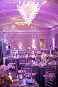 Elegant Purple and white ballroom wedding reception with uplighting and chihuly chandelier | downtown St. Pete Historic Hotel Venue Vinoy Renaissance | Tampa Bay Planner Parties a la Carte