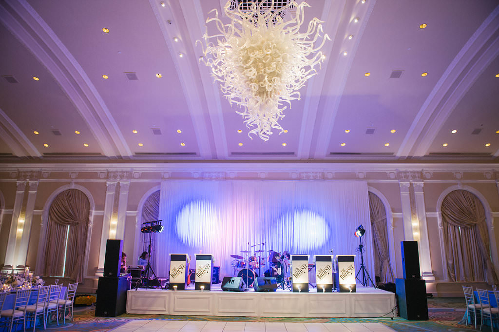 Live Wedding Band setup for ballroom wedding reception with uplighting and chihuly chandelier | downtown St. Pete Historic Hotel Venue Vinoy Renaissance