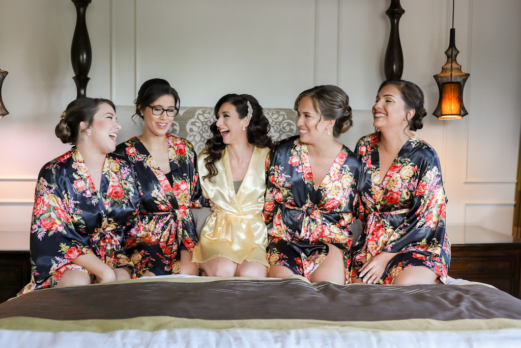 Florida Bride and Bridesmaids Getting Ready Wedding Portrait in Floral Matching Robes, Bride in Yellow Robe | Tampa Bay Wedding Photographer Lifelong Photography Studio | St. Pete Wedding Hair and Makeup Artist Destiny and Light
