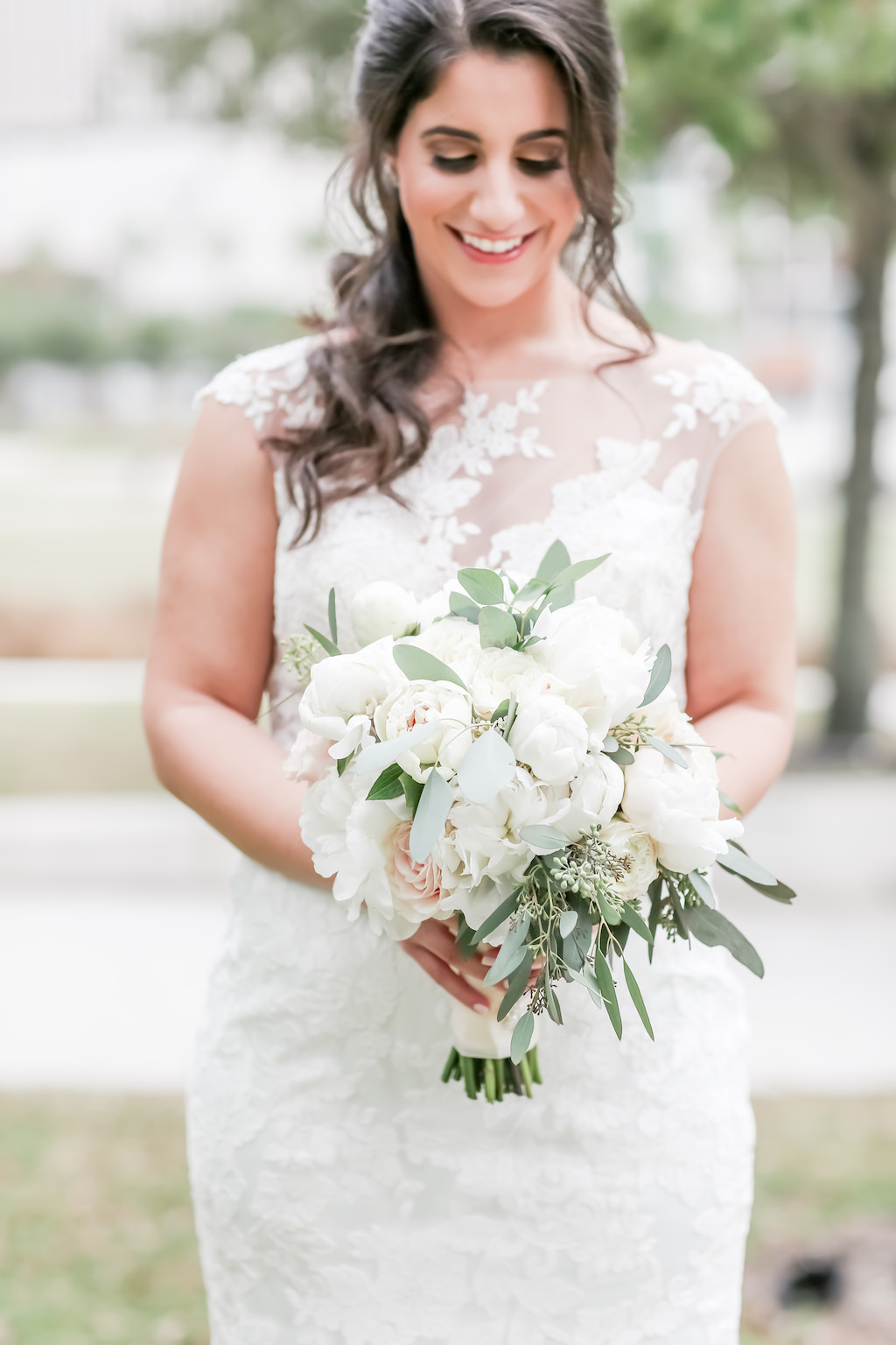 Florida Bride Outdoor Wedding Portrait, Bride in Lace and Illusion High Neckline Cap Sleeve Fit and Flare Wedding Dress with White and Greenery Floral Bouquet | Tampa Bay Wedding Photographer Lifelong Photography Studios | Hair and Makeup Artist Femme Akoi