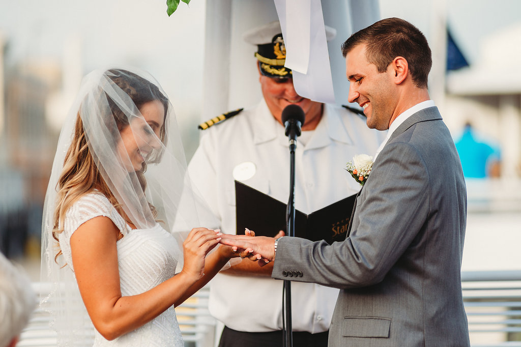 Florida Bride and Groom Wedding Ceremony Exchanging Vows Portrait | Tampa Waterfront Wedding Venue Yacht Starship IV
